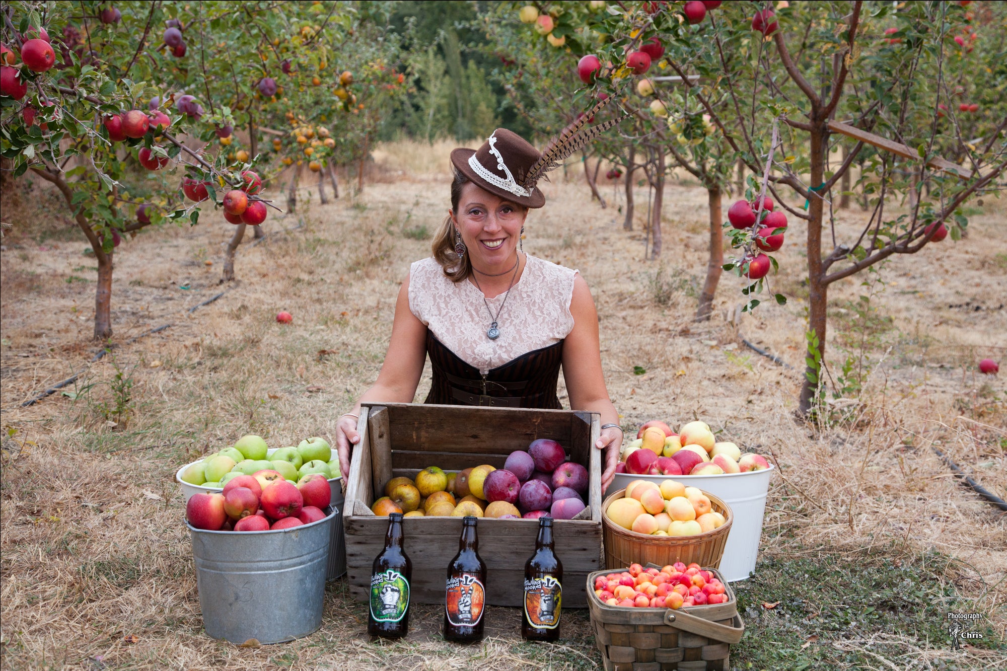 Cidermaker Kate shows off the variety of heritage apples that go into Howling Moon Craft Cider in Oliver BC