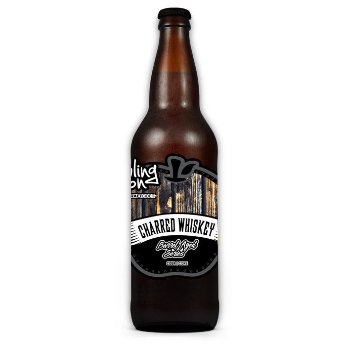 Charred Whiskey Barrel Aged Howling Moon Craft Cider, made from heritage apples in Oliver BC
